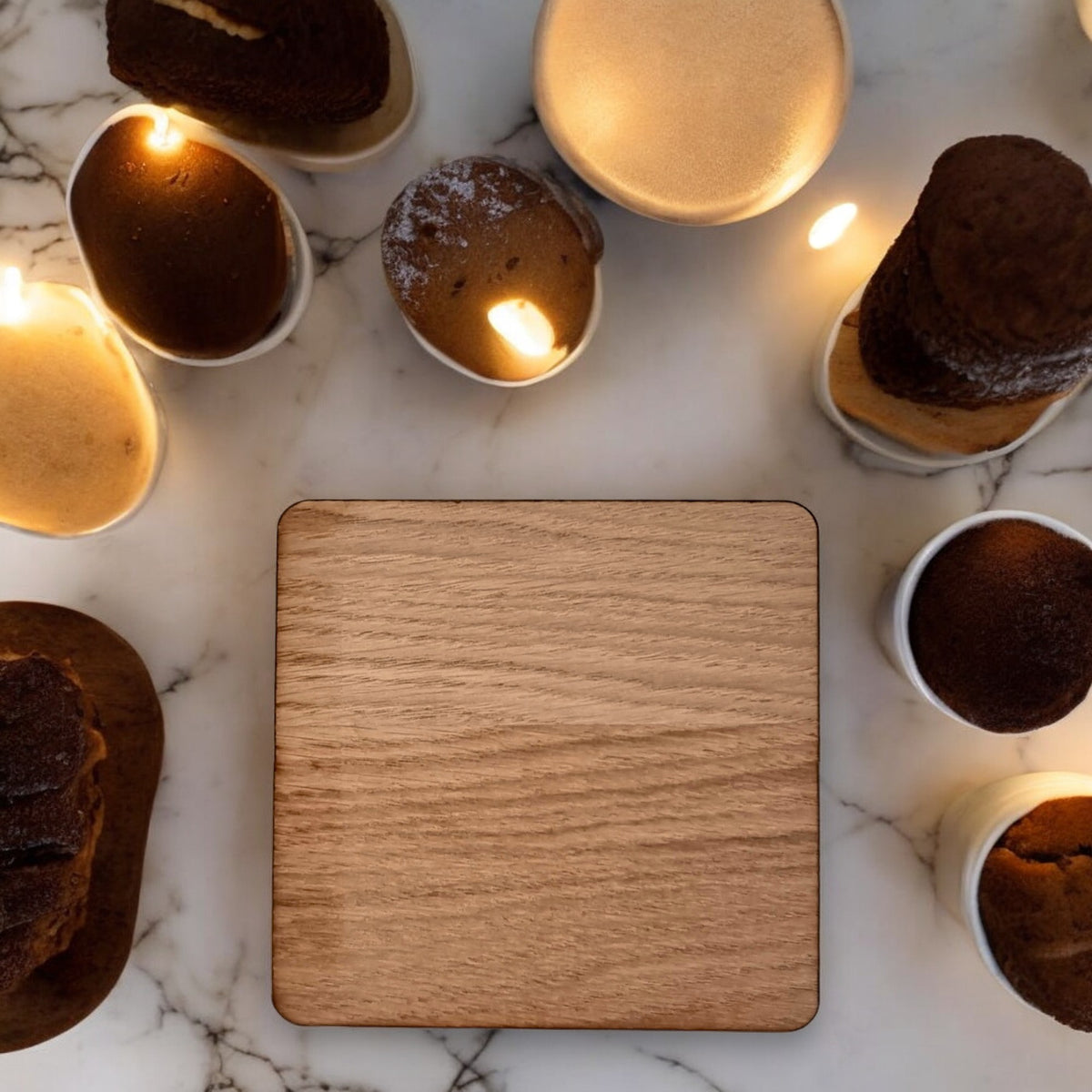 A plain, square, light wood coaster or placemat by SuperCoolCreations set on a marble surface with warm lighting.