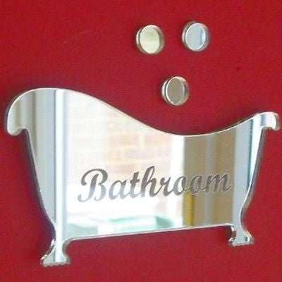 Engraved mirrored bathtub-shaped sign with "Bathroom" text, and three circular bubble mirrors above.