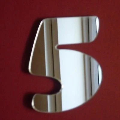 Number 5 mirror, shaped like the digit five with a reflective surface.
