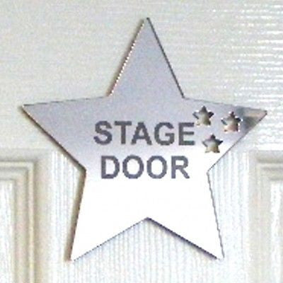 Star-shaped mirrored door sign with the etched text "STAGE DOOR" and three small cut-out stars.