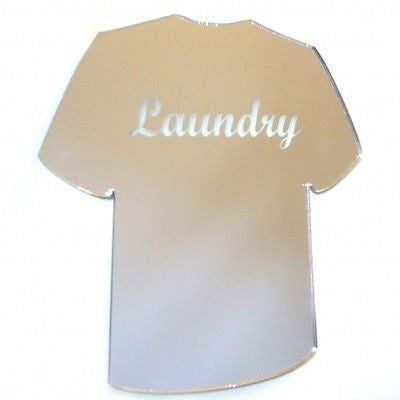 T-shirt-shaped mirror with the word "Laundry" etched in cursive on the front.