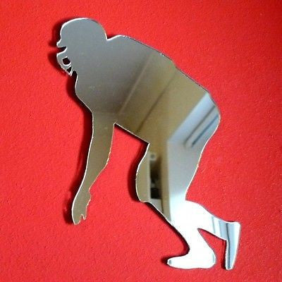 American football player shaped mirror in a three-point stance on a red background.