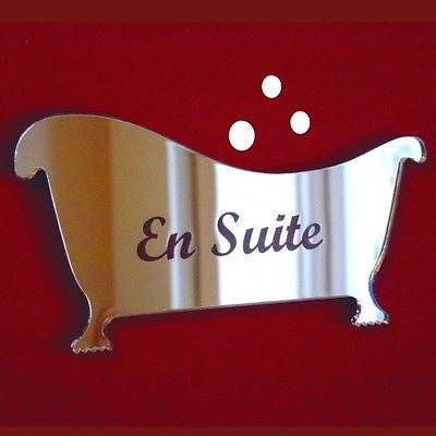Mirrored bathtub-shaped sign with the engraved text "En Suite" and three small bubbles.