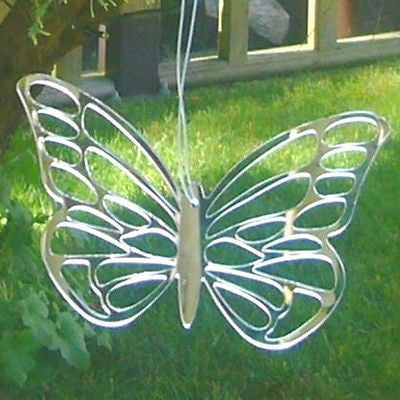 Silver mirrored butterfly shaped hanging ornament with cutouts in the wings.