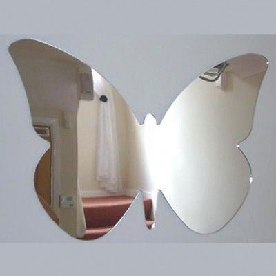 Butterfly Big Wings Mirror mounted on a wall, shaped like a butterfly with large reflective wings.