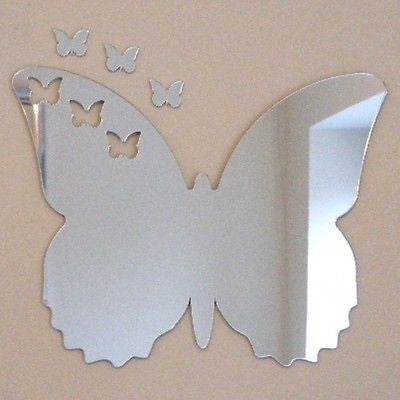 Silver butterfly-shaped wall mirror with four butterfly cutouts and three separate small butterflies.