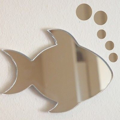 Fish and bubbles shaped acrylic mirror set mounted on a white wall.