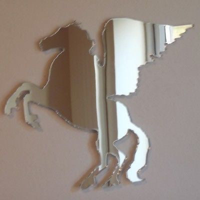 Pegasus-shaped mirror mounted on a plain wall.
