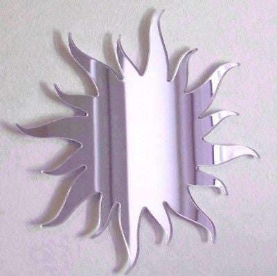 Sun-shaped silver mirror with wavy, flame-like rays extending outwards.