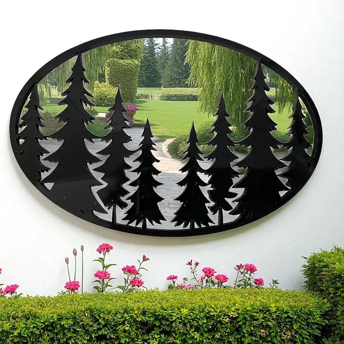 Oval garden mirror with a black frame featuring a cut-out pine tree silhouette design.