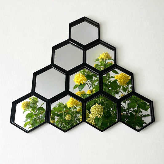 Cluster of 7 black-framed hexagonal mirrors forming a honeycomb shape, reflecting green plants with yellow flowers.