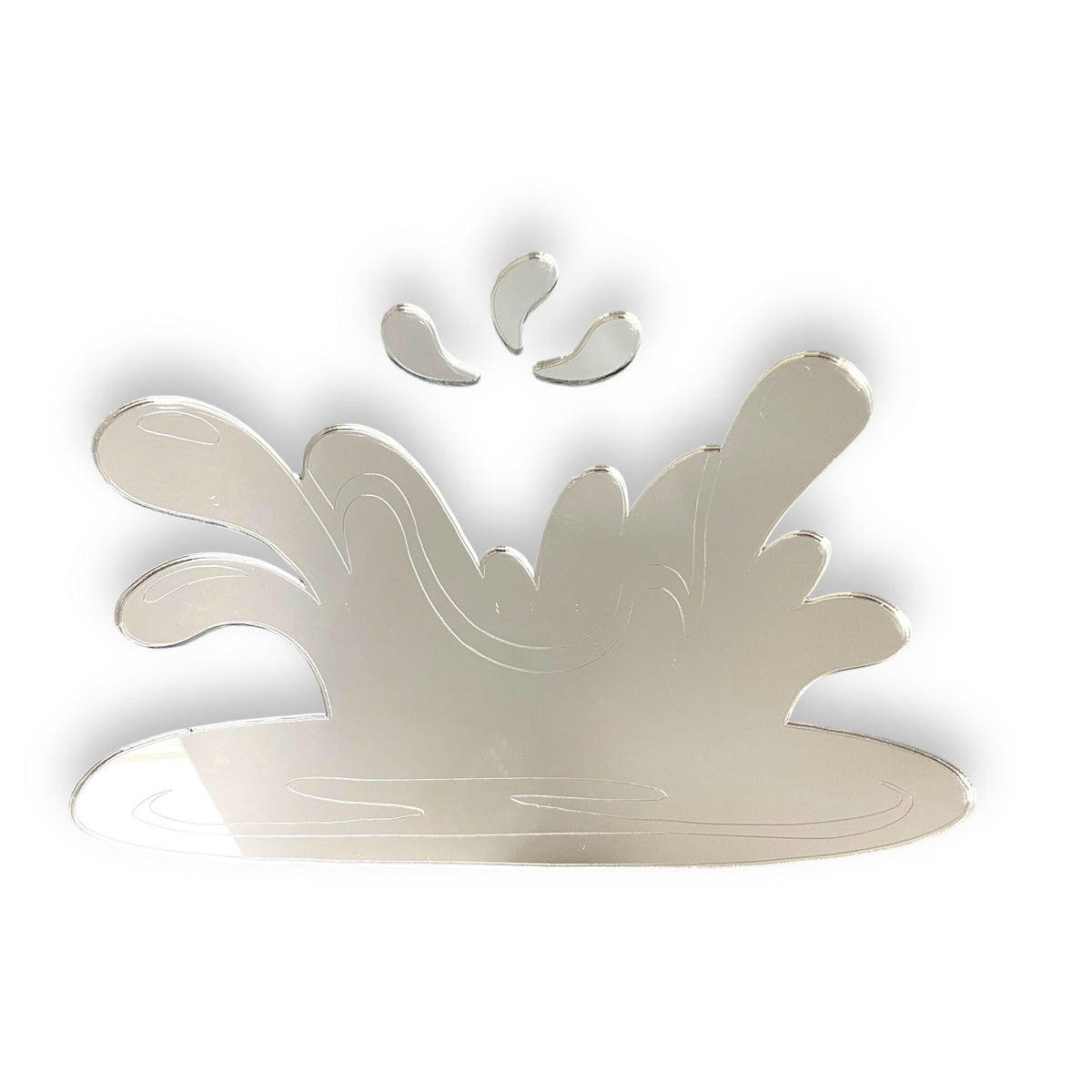 Etched wave splash-shaped mirror featuring a reflective surface with droplet and ripple engravings.