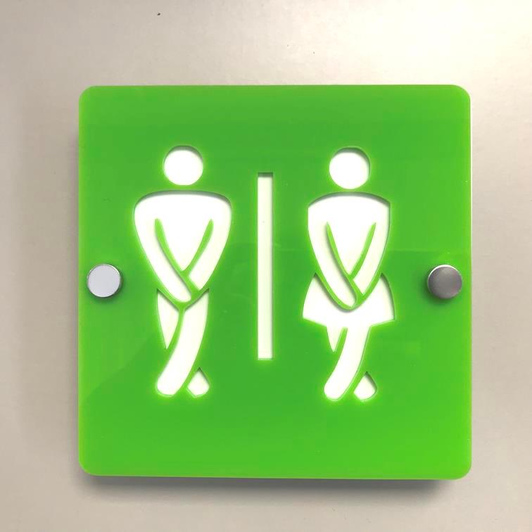 Square green acrylic toilet sign with cutouts of crossed-legged figures holding themselves.