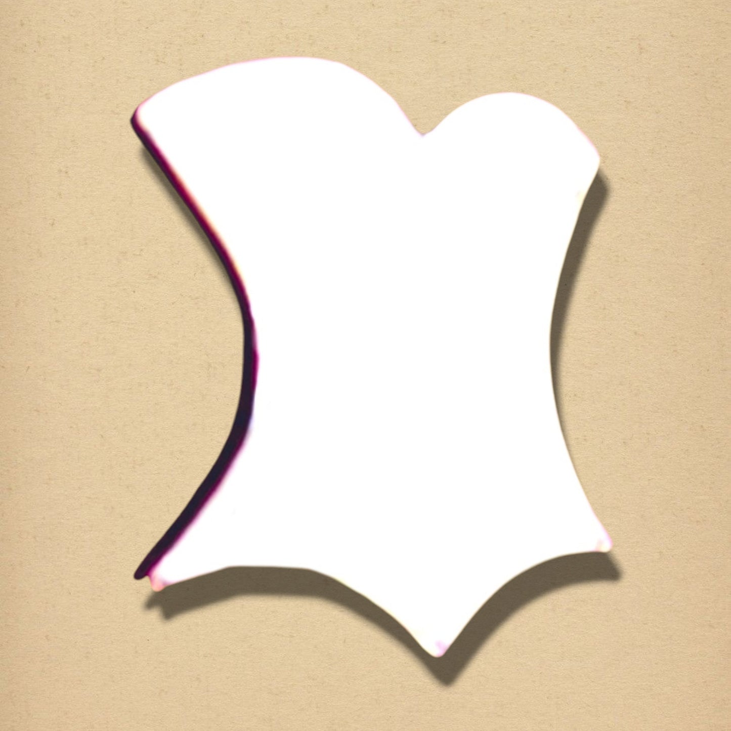 A white, bodice-shaped wall mirror with a curved, scalloped hemline against a textured beige background.