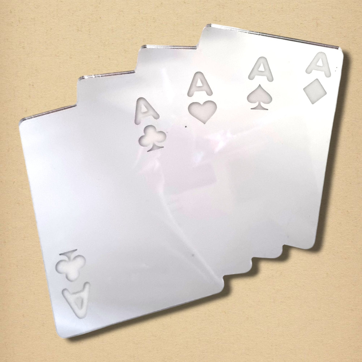 Aces High Mirror shaped like a fan of four ace playing cards in reflective silver.