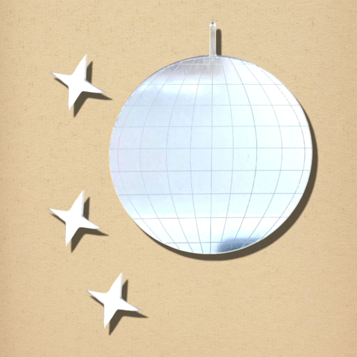Silver acrylic mirror shaped like a disco ball with three matching star-shaped mirrors.