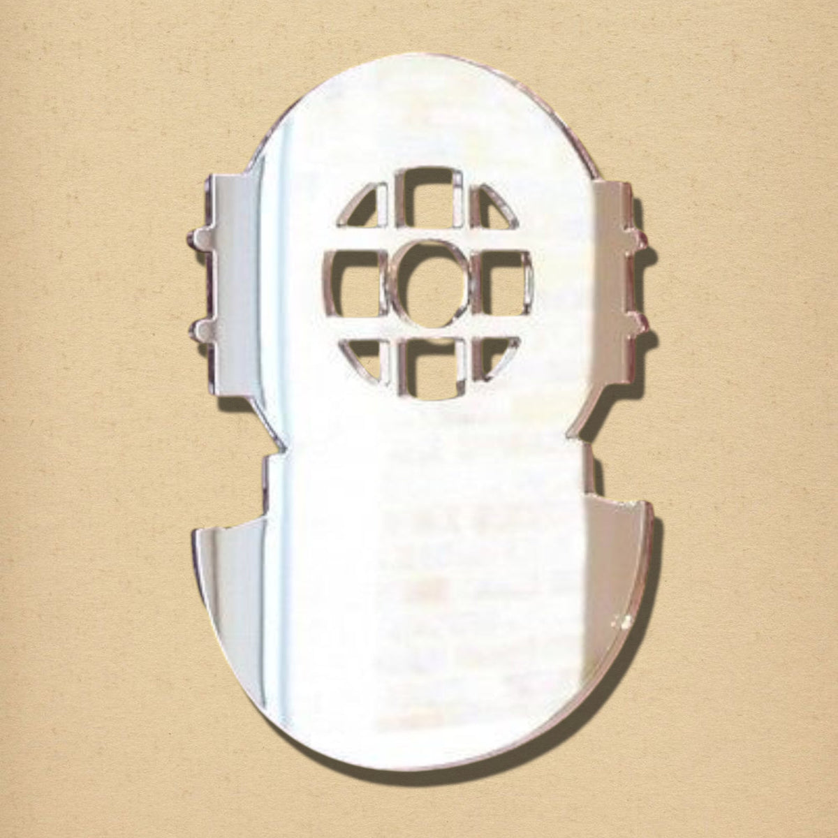 Reflective silver-colored mirror shaped like a vintage deep-sea diving helmet with a grated circular window.