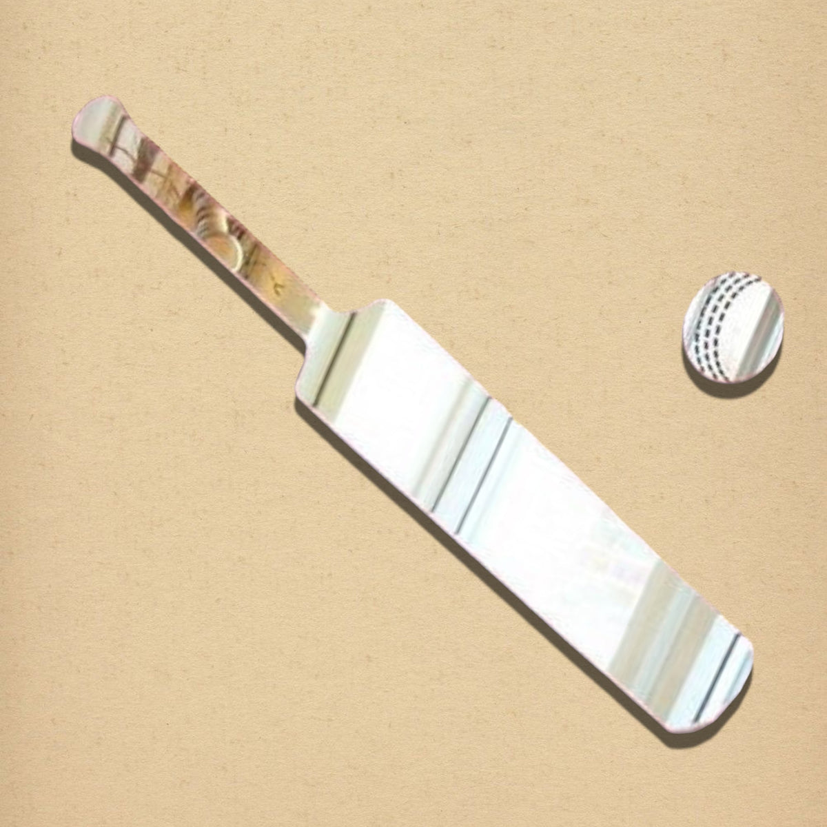 Cricket bat and ball shaped mirrors against a light brown background.