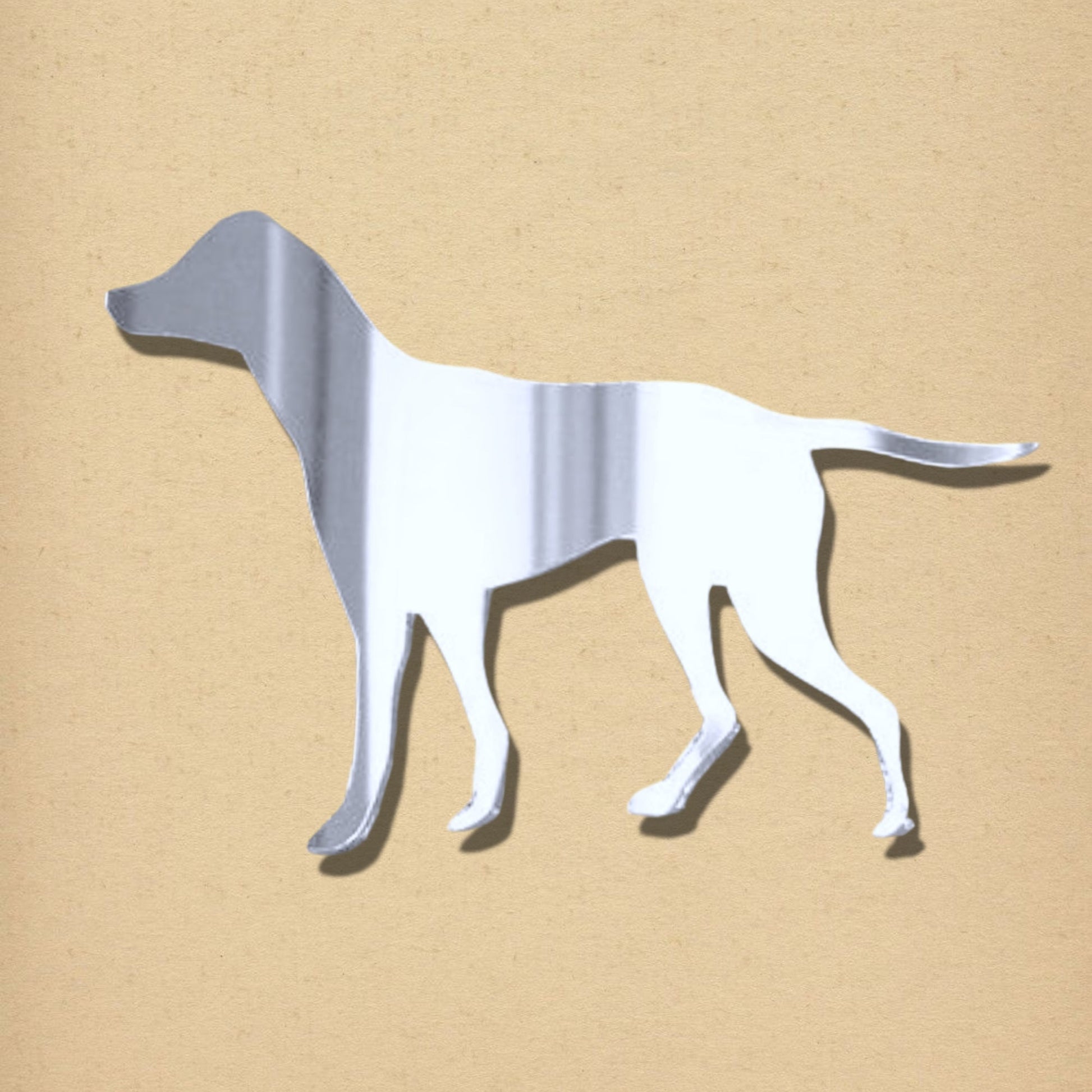 Silver mirror in the shape of an English Pointer dog against a neutral background.