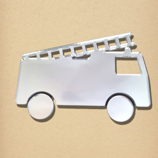 Fire engine-shaped mirror made of silver acrylic, featuring a cutout ladder on top and two round wheels.