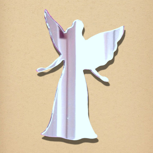 Fairy-shaped reflective mirror with wings, against a beige background.