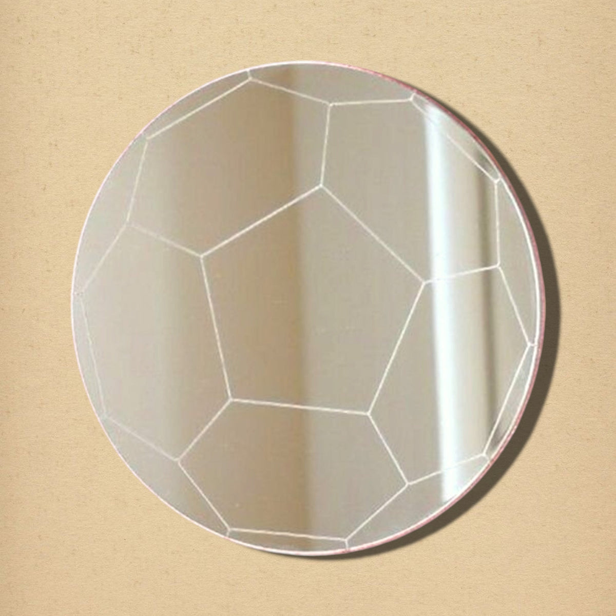 Round football mirror with etched soccer ball pattern, featuring pentagonal and hexagonal panel lines.