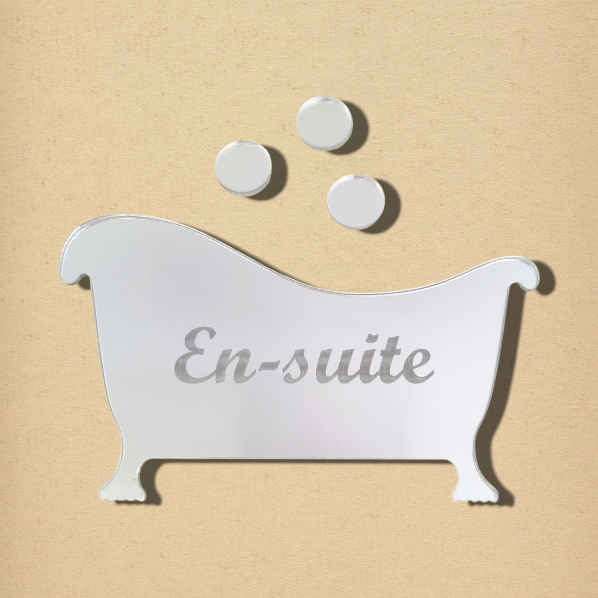 Bathtub-shaped mirrored acrylic sign with engraved "En-suite" text and three bubble shapes above.