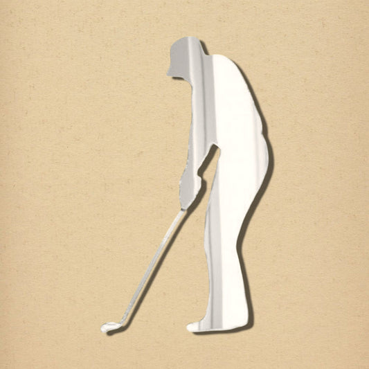 Silver reflective mirror shaped like a golfer addressing a ball, displayed on a textured beige background.