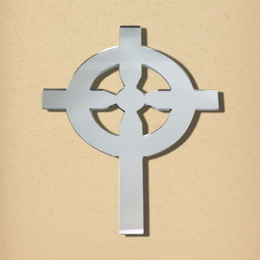 Gothic cross-shaped acrylic mirror in reflective silver, featuring a central circle overlay on a neutral background.