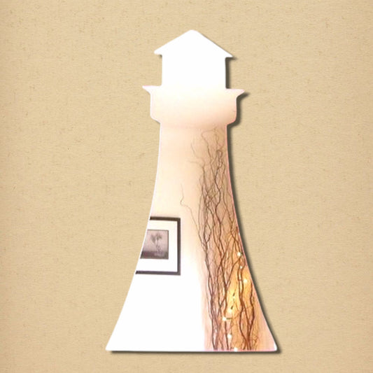 A lighthouse-shaped wall mirror with a tapered body and top lantern room design on a textured beige background.
