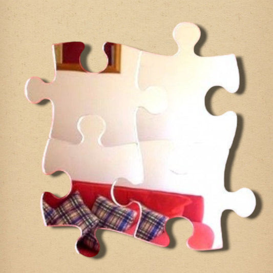 Four interlocking jigsaw puzzle-shaped mirrors forming a square.