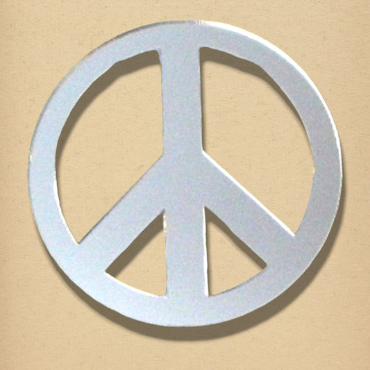 Peace sign acrylic mirror in a circular shape against a beige background.