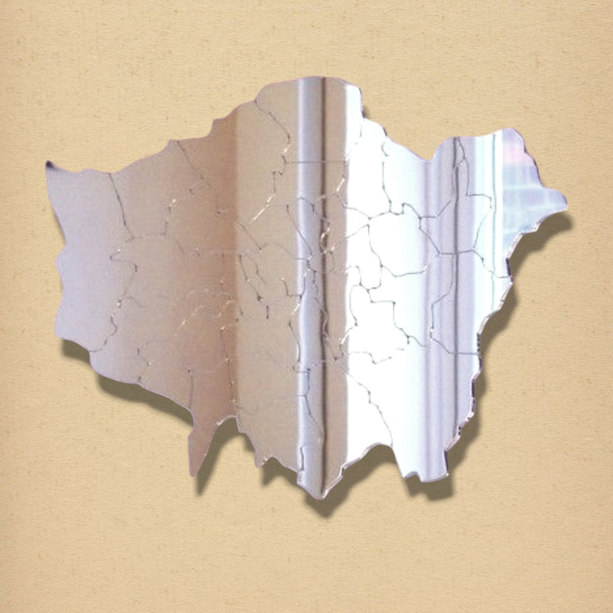 London Map shaped reflective acrylic mirror with etched borough boundary lines.