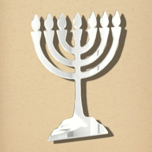 Menorah-shaped silver acrylic mirror on a tan textured background.