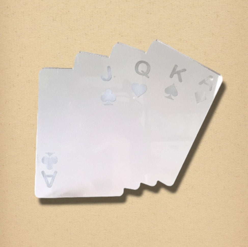 Silver poker cards mirror shaped like a fan of four playing cards against a beige background.