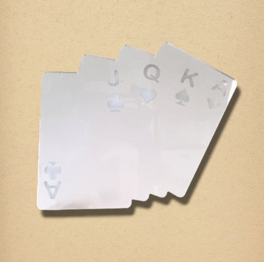 Silver poker cards mirror shaped like a fan of four playing cards against a beige background.