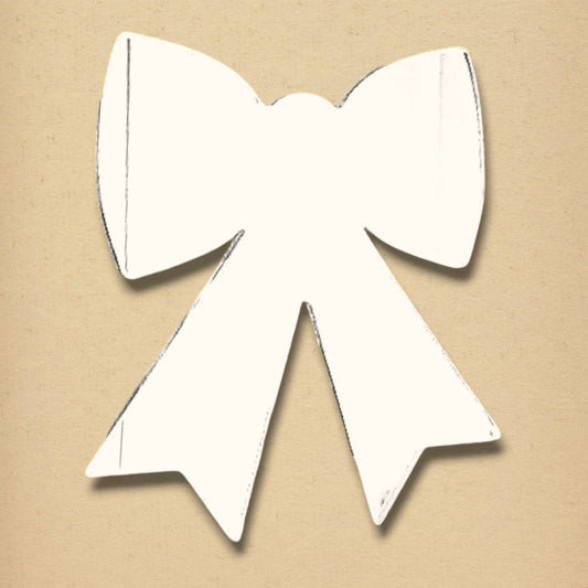 White ribbon-shaped mirror against a tan background.