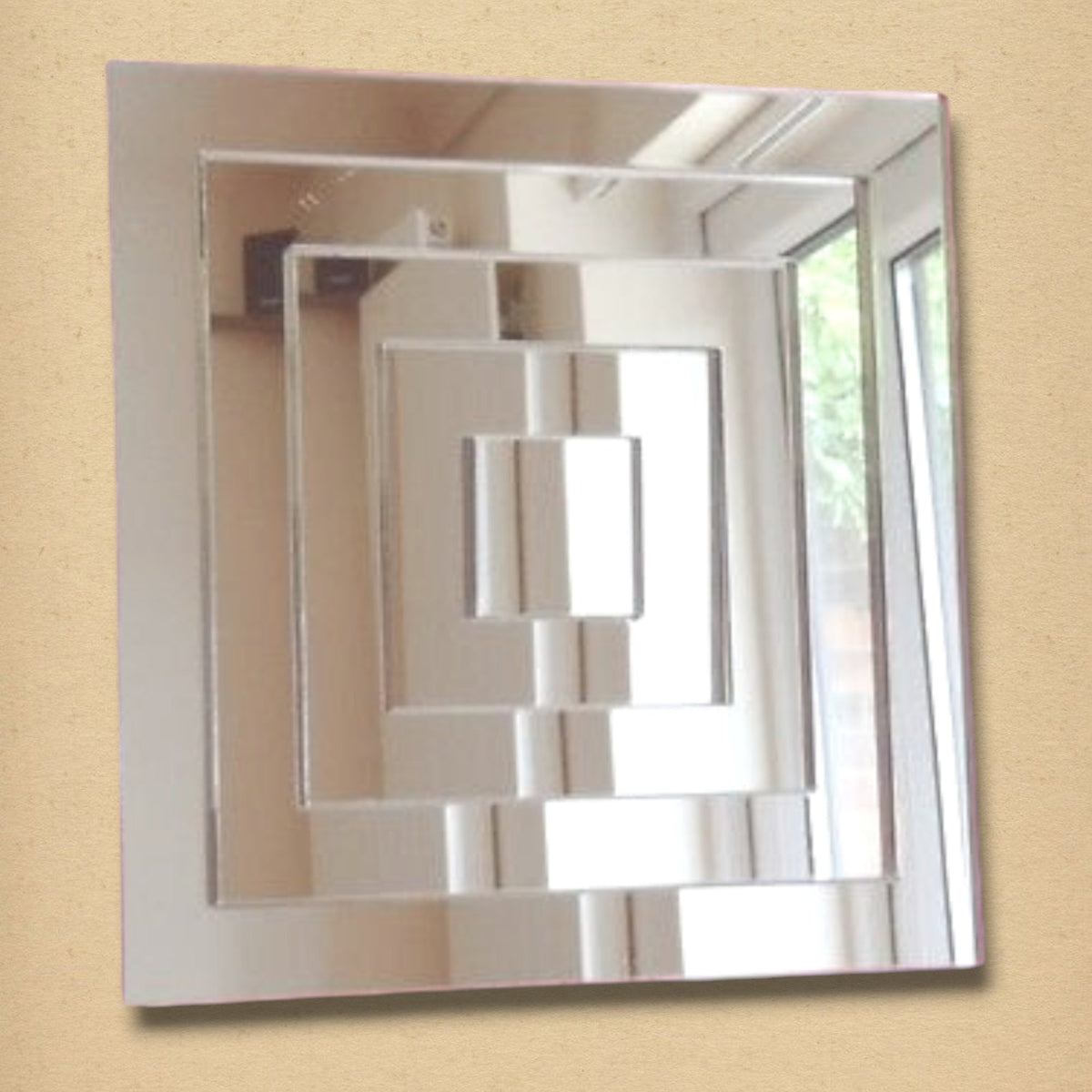 Square infinity mirror featuring nested, reflective square frames creating a receding tunnel effect.
