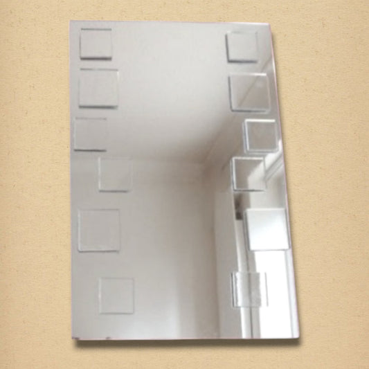 A rectangular mirror decorated with smaller mirrored squares arranged along both sides.