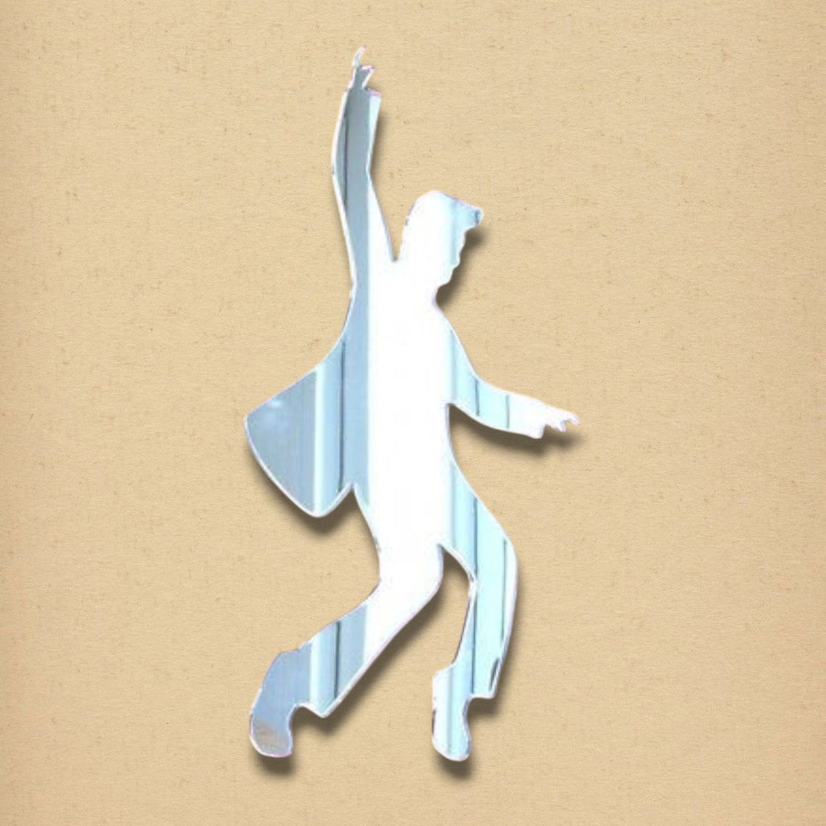 Silver mirror in the silhouette shape of a dancing rock 'n' roll musician.