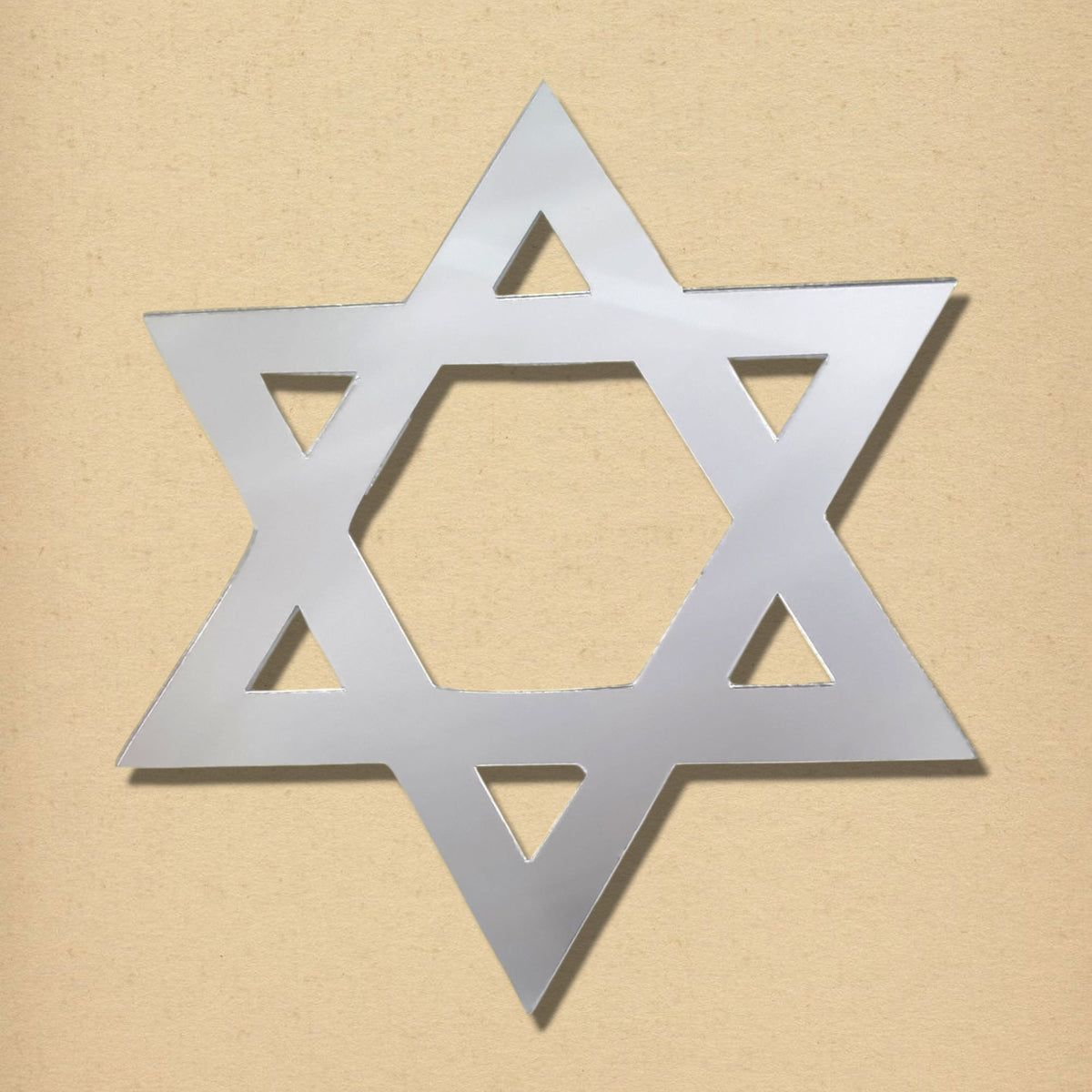 Silver Star of David shaped acrylic mirror against a light brown background.