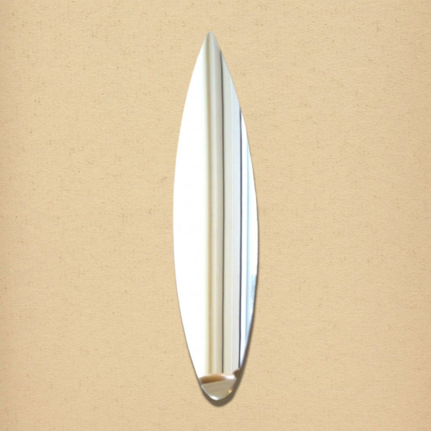 A surfboard-shaped mirror centered on a textured beige wall.
