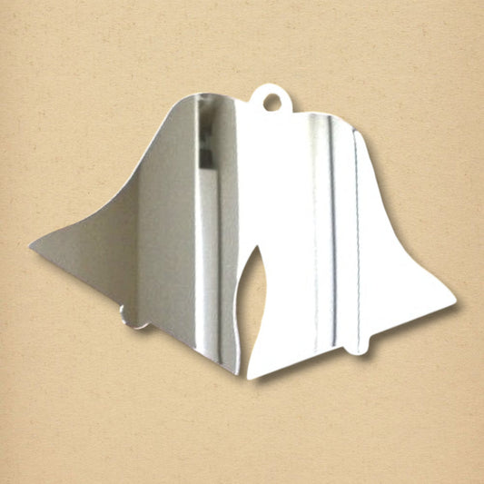 Wedding bells-shaped silver acrylic mirror with a hanging hole at the top on a tan background.