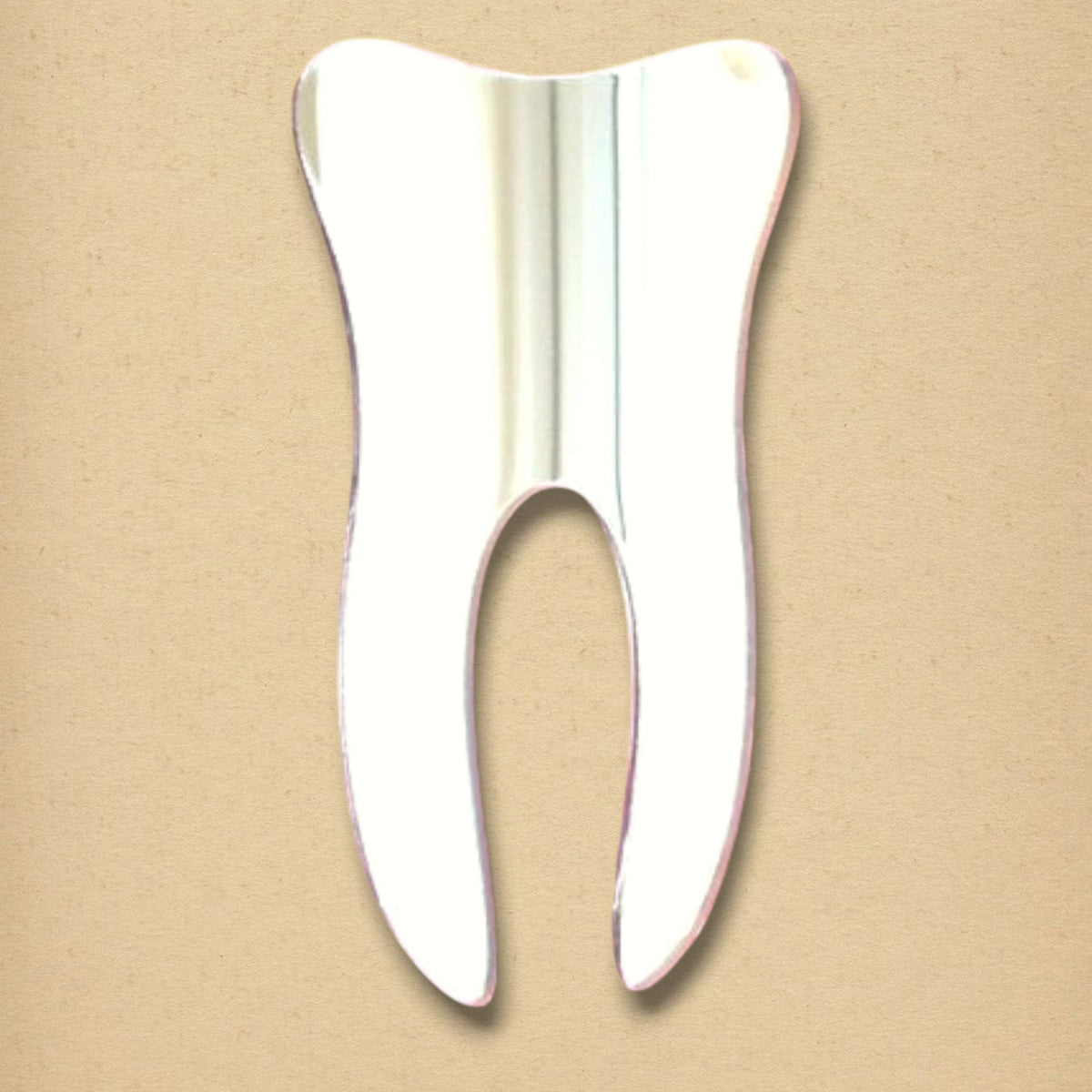 Tooth-shaped reflective mirror on a neutral tan background.