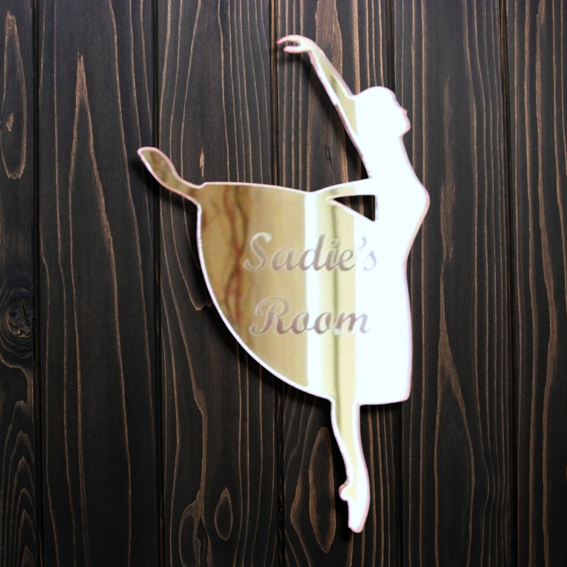 Personalised ballerina mirror door sign, shaped like a dancing ballerina, engraved with "Sadie's Room."