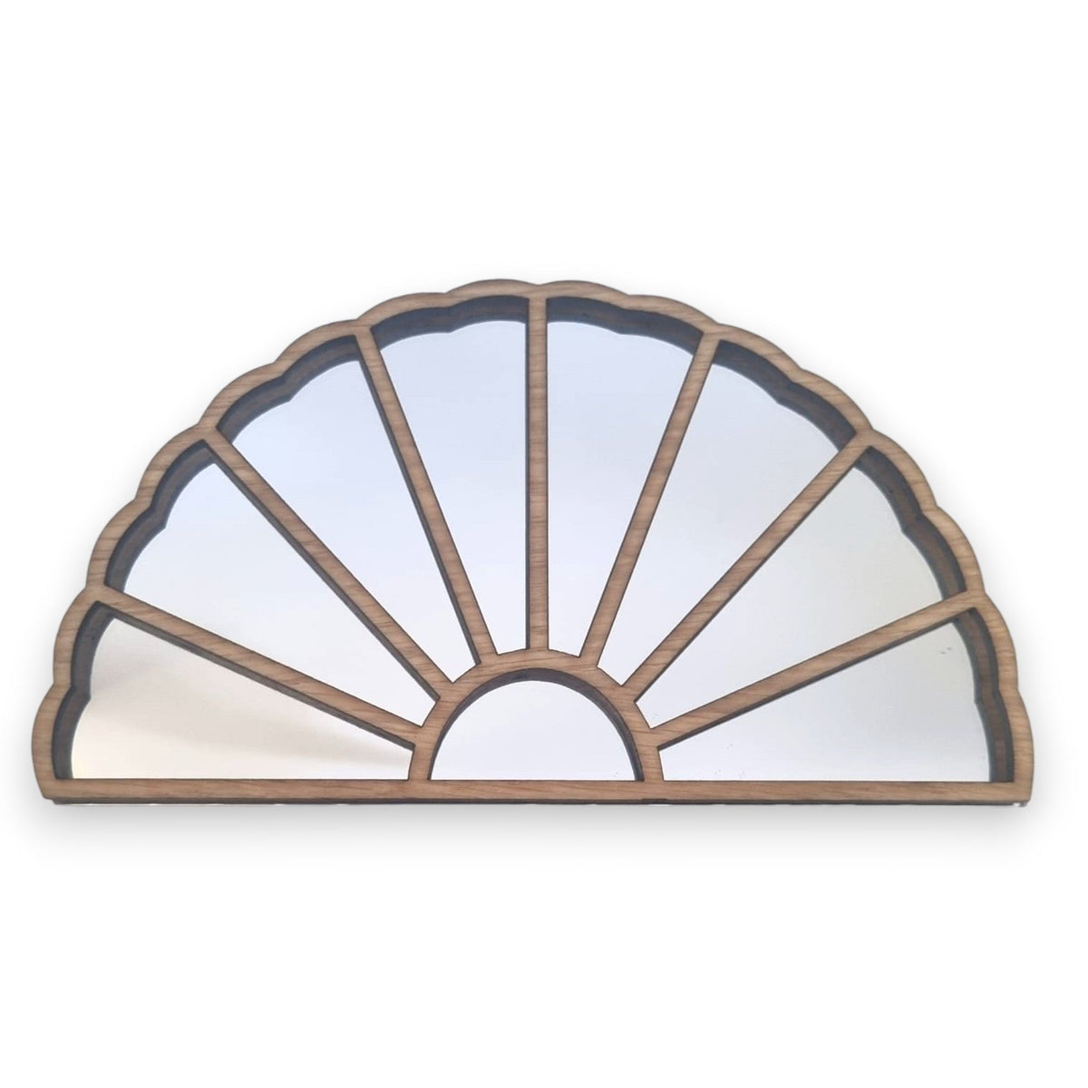 Art Deco-style fan-shaped wood-framed mirror with segmented panels.