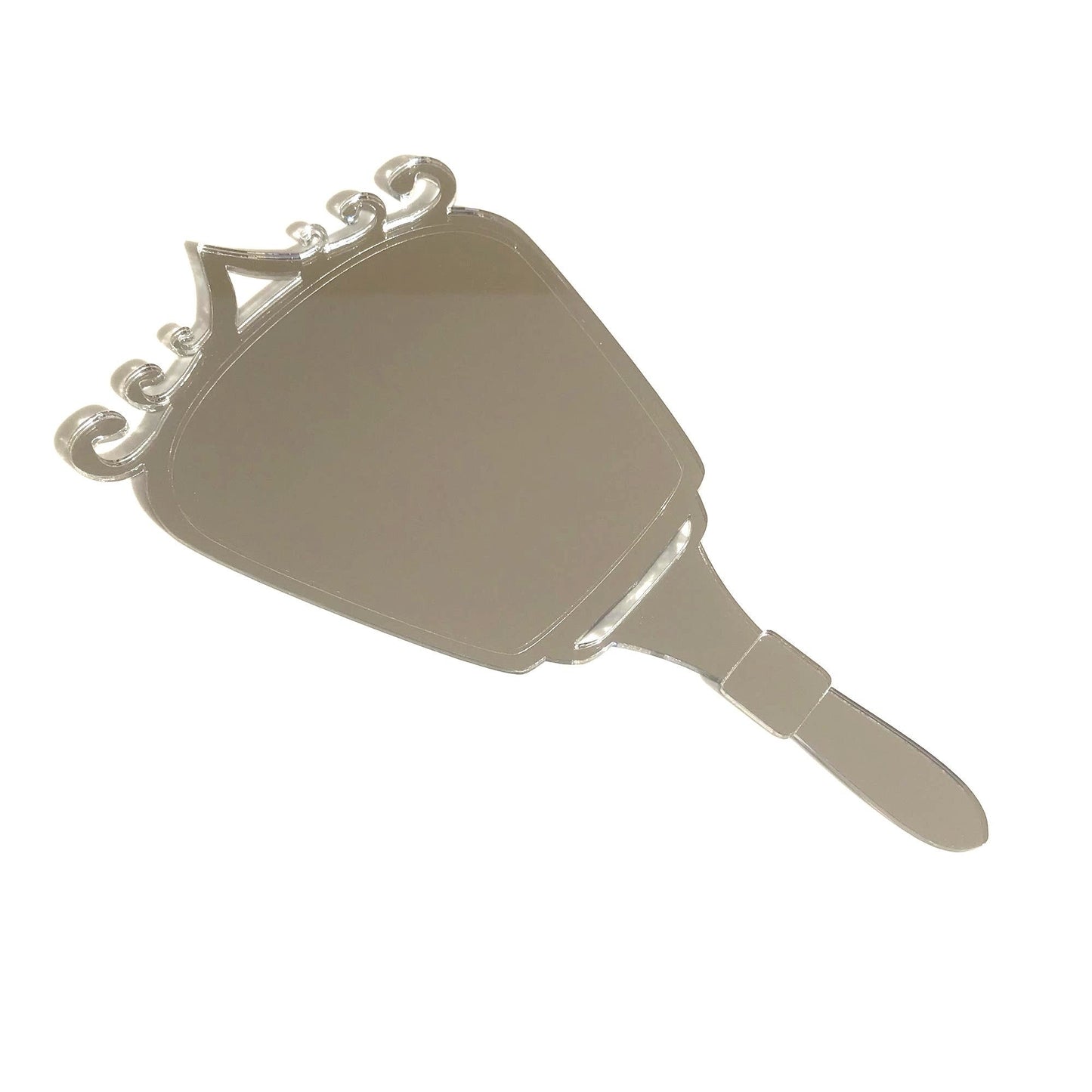Silver reflective hand-held mirror with an Art Deco swirl design top and a short handle.