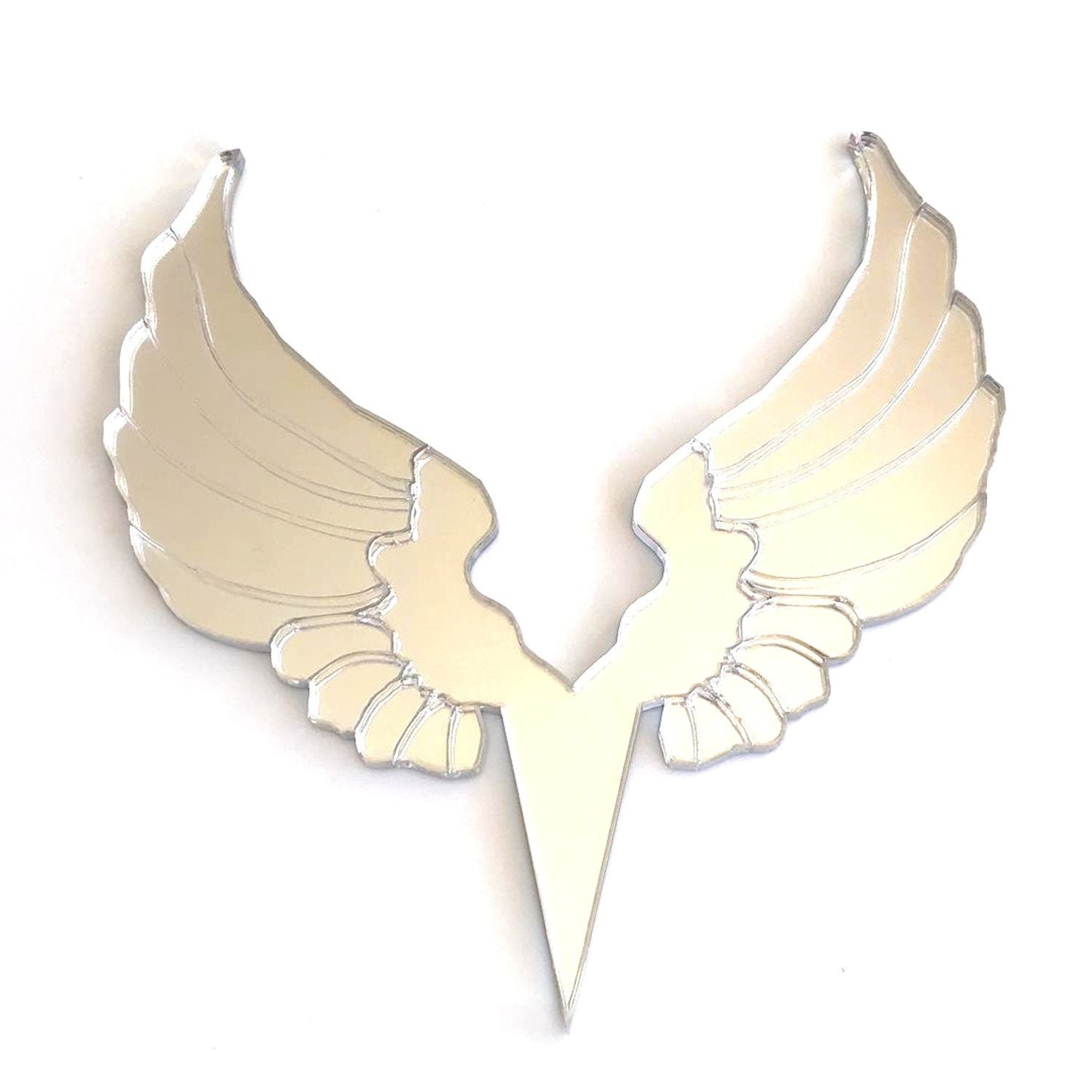 Reflective silver mirrored angel wing-shaped cake topper with a sharp, pointed base for inserting into a cake.