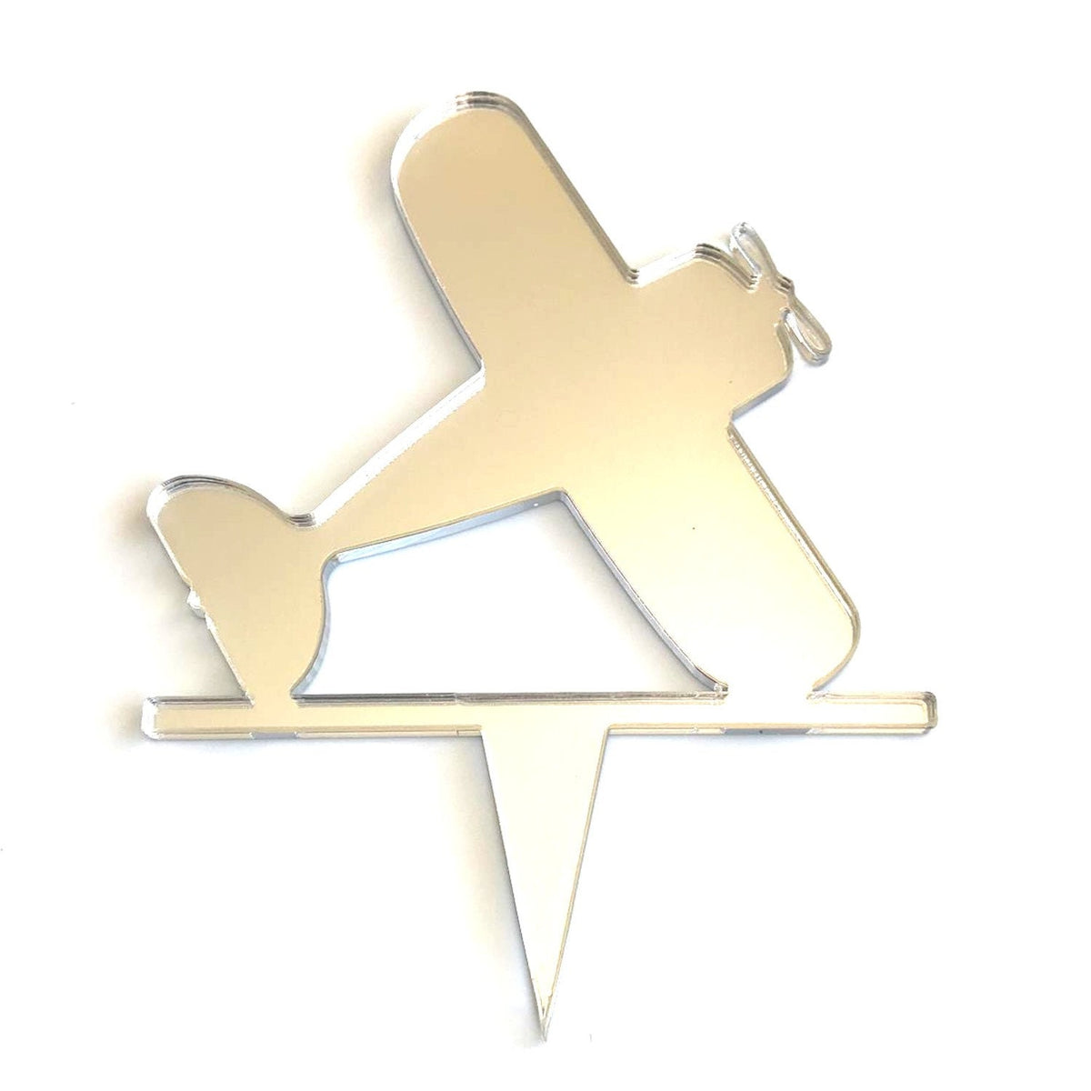Shiny silver mirror acrylic biplane cake topper on a pointed stake against a white background.
