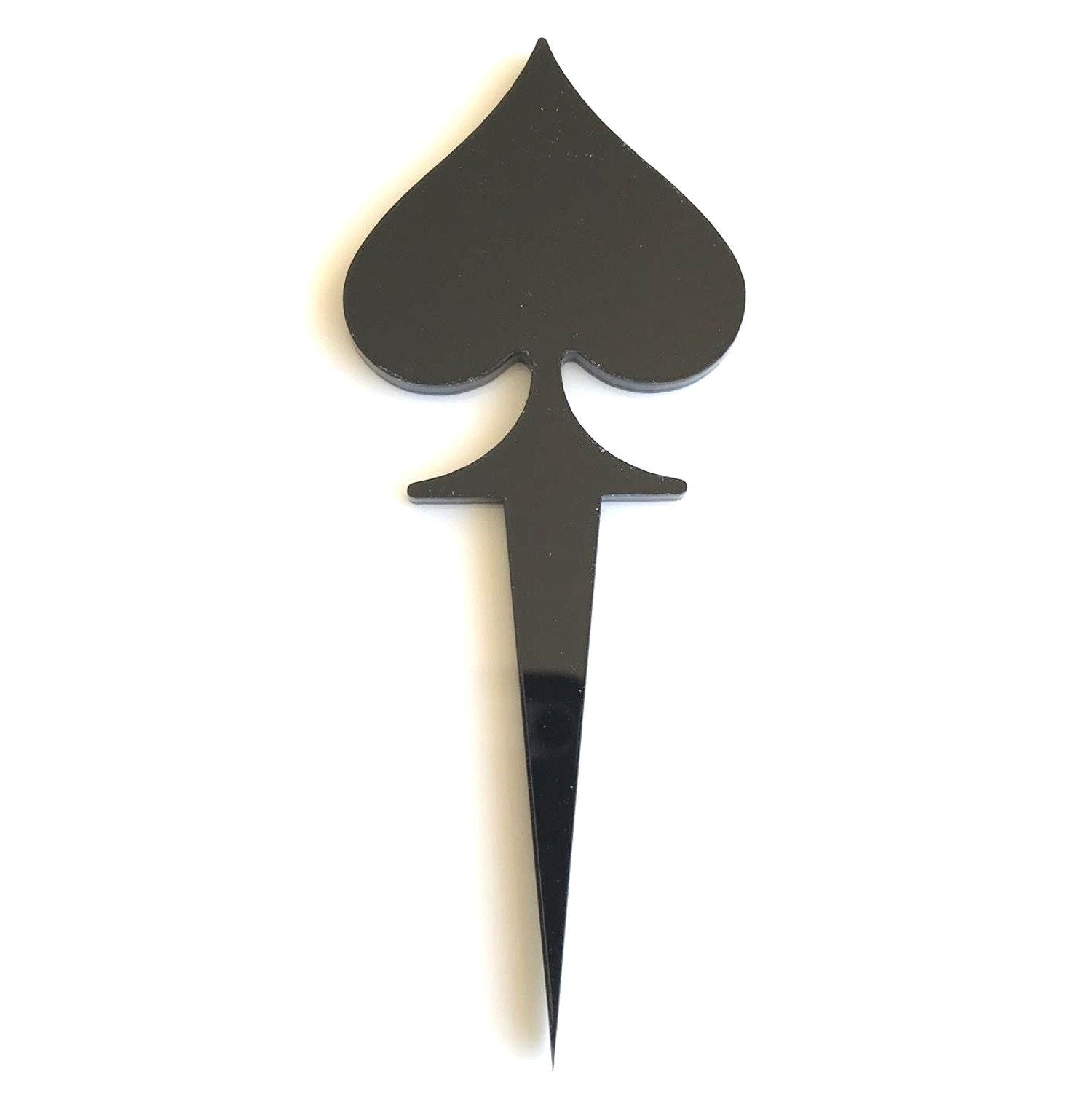 Black acrylic playing card spade suit cake topper with a sharp, pointed base for inserting into a cake.